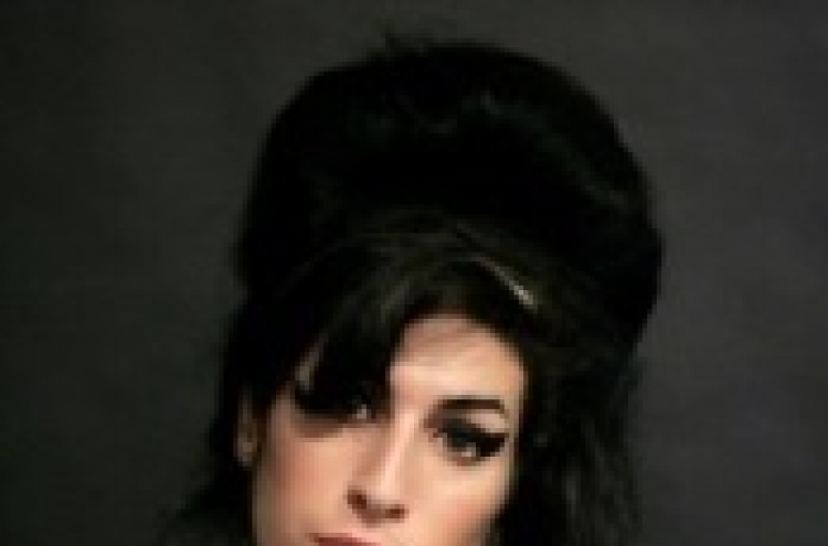 Coroner: Amy Winehouse died from too much alcohol