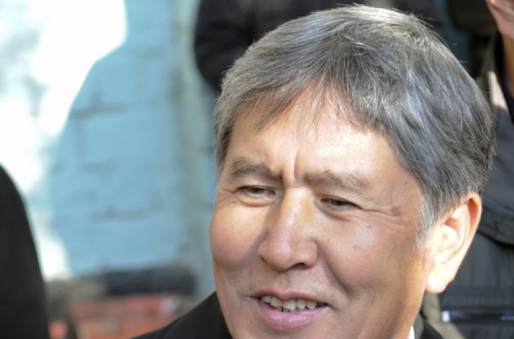 Kyrgyz premier cruises to presidency in disputed poll