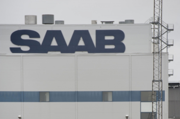GM could cut business with Saab