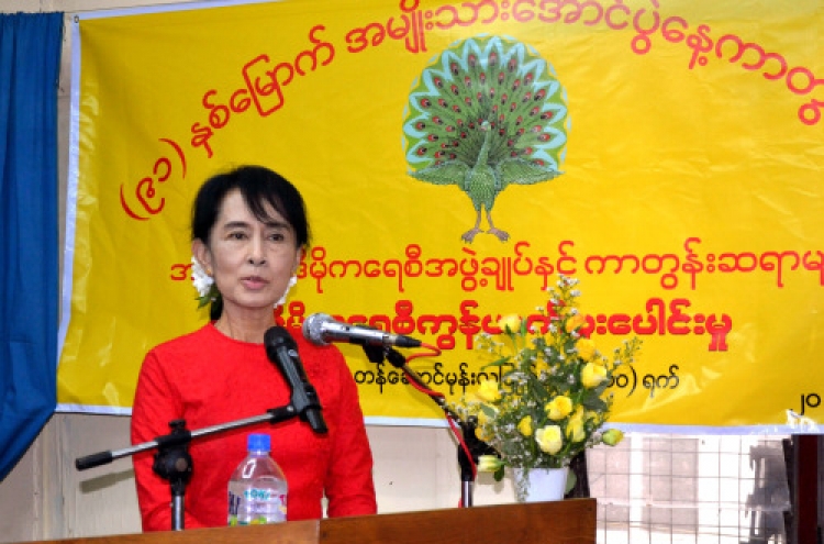 Myanmar's Suu Kyi to run in parliamentary polls