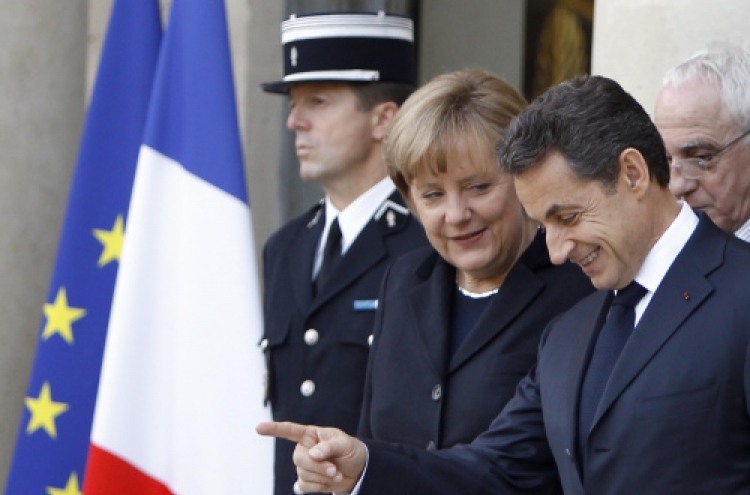 Merkel, Sarkozy want new EU treaty