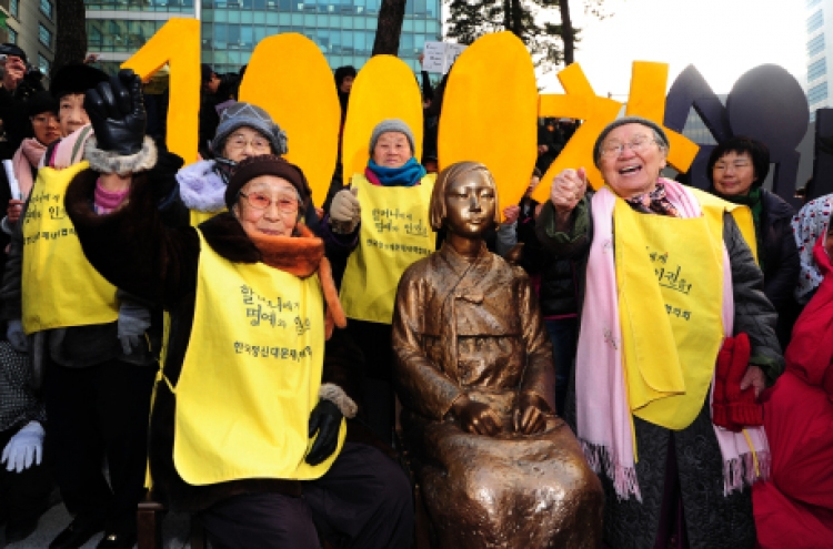 Sex slavery victims set up monument at 1,000th rally