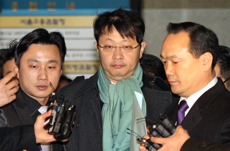 SK vice chairman arrested on embezzlement charges