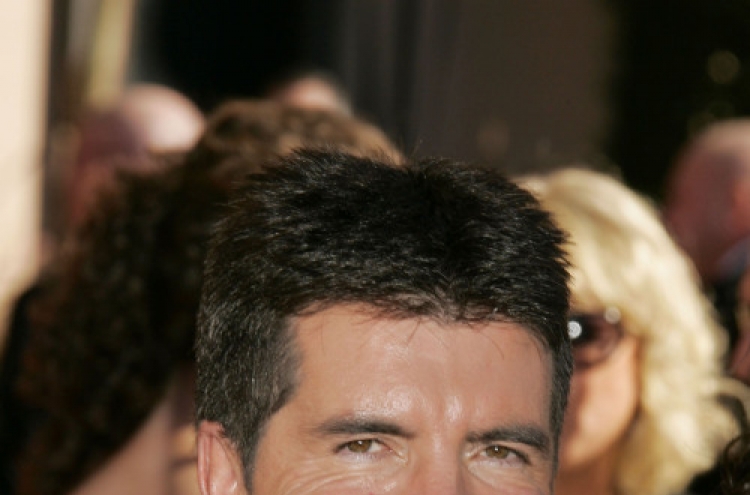 Unauthorized biography spills Cowell secrets