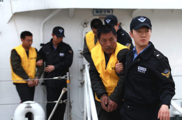 Warrant sought for Chinese fishermen as Seoul protests