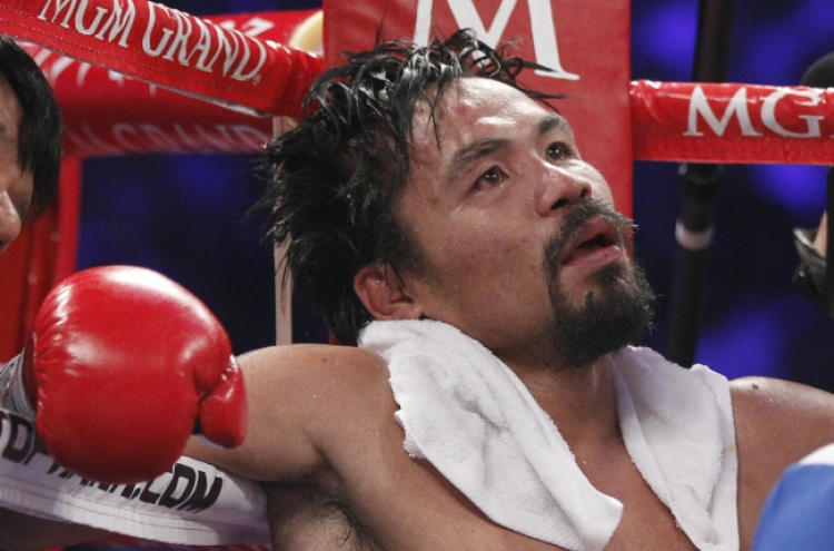 Boxing hero’s loss stuns Philippines