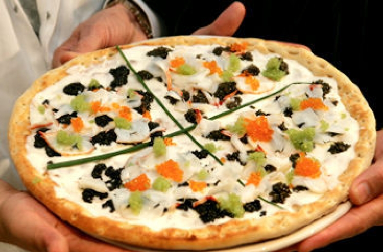 New York restaurant unveils $1,000 pizza