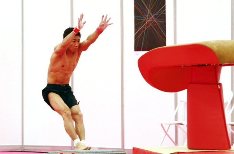 Yang and Koczi take to the air for London gold medal