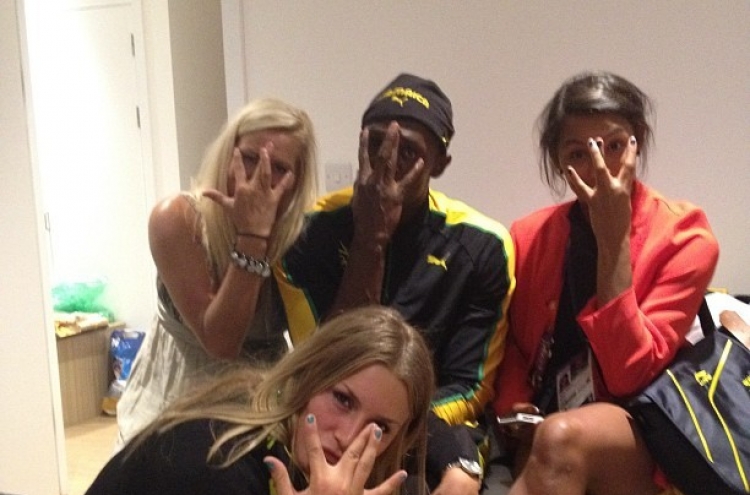 Usain Bolt enjoys midnight party with Swedish female athletes after 100m win