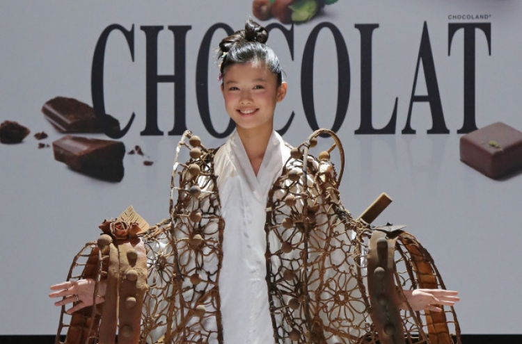 ‘May Queen’ actress hits Paris catwalk in chocolate dress