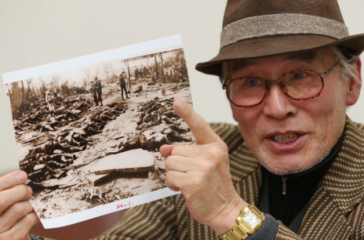 Historian releases photos of Japanese post-quake massacre
