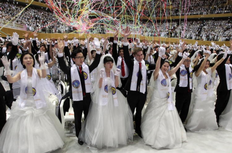First mass wedding held since church founder’s death