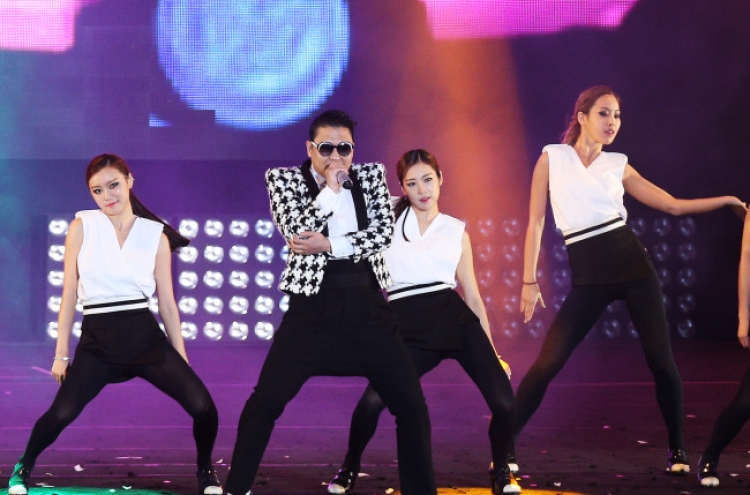 Psy sweeps stage with 'Gentleman'
