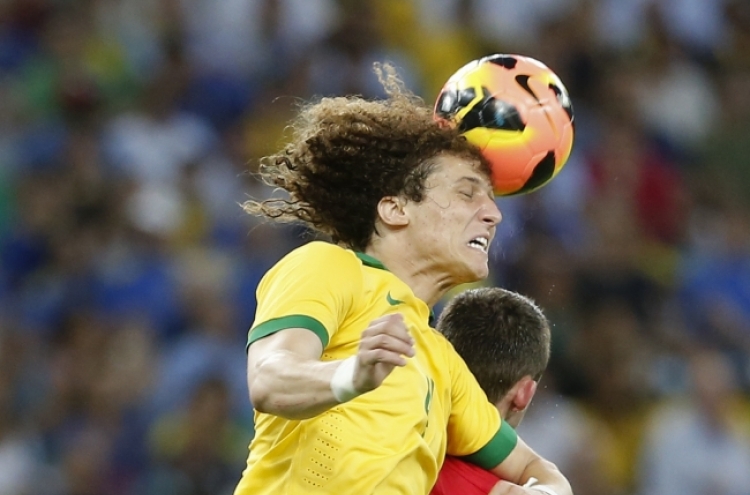 Brazil held 2-2 by England as Maracana re-opens