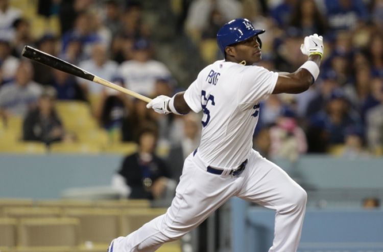 Puig homers twice to power Dodgers
