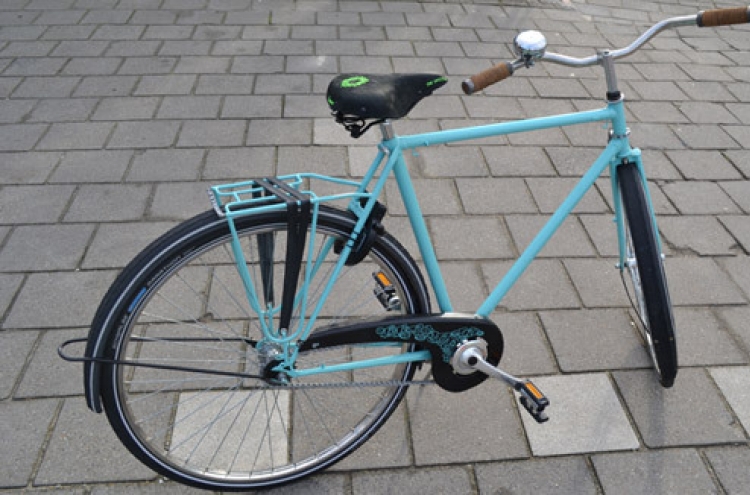 Dutch duo peddle old bikes as fashion, furniture