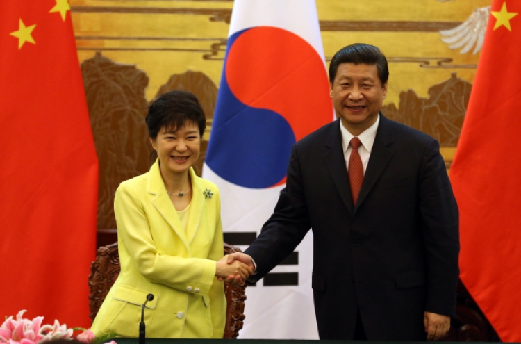 Park, Xi vow closer cooperation on N. Korea denuclearization