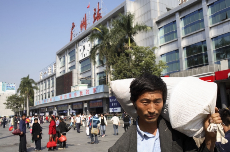 China migrant workers less insured