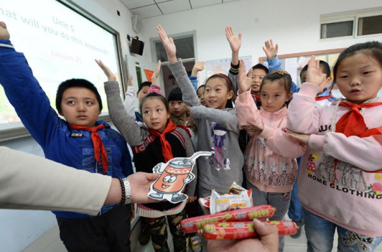 China eases up on English for students