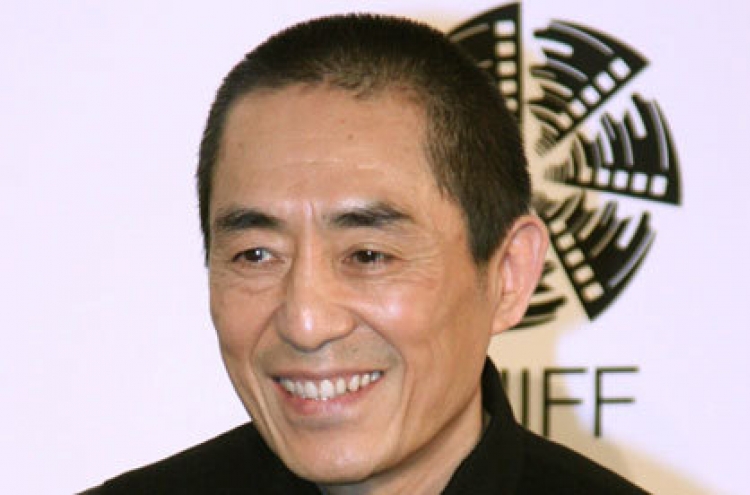 Star Chinese director admits defying one-child rule