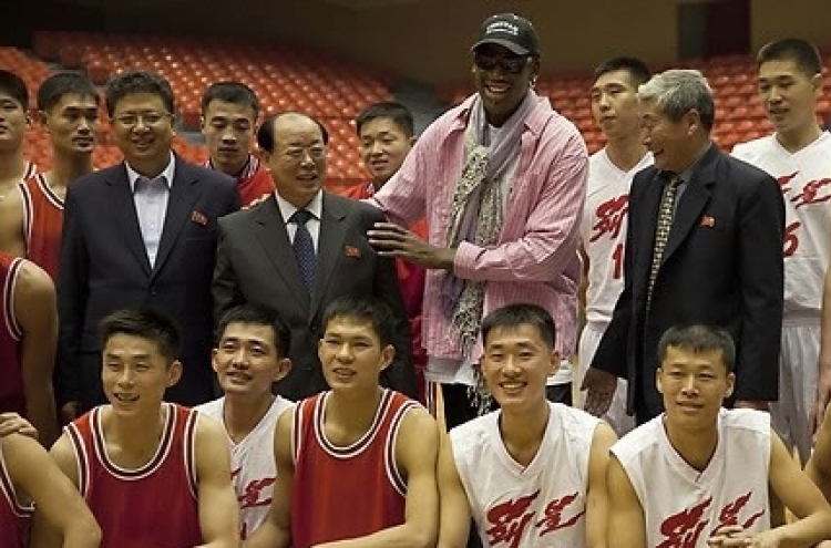Rodman names team for exhibition