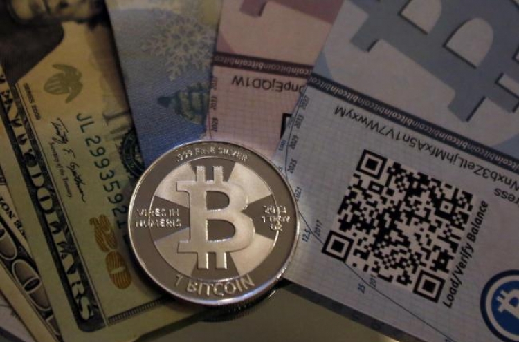 Bitcoin dealers charged with money laundering