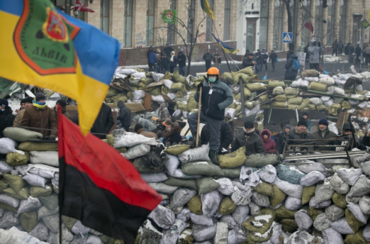Ukrainian opposition holds rally after EU, U.S. support pledges