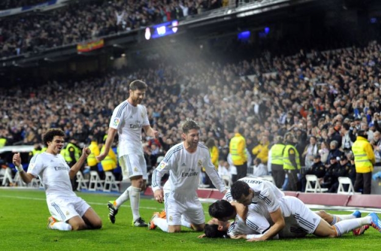 Madrid, Barcelona bag wins