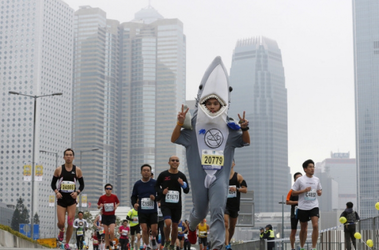 Marathoners voice support for press freedom in Hong Kong