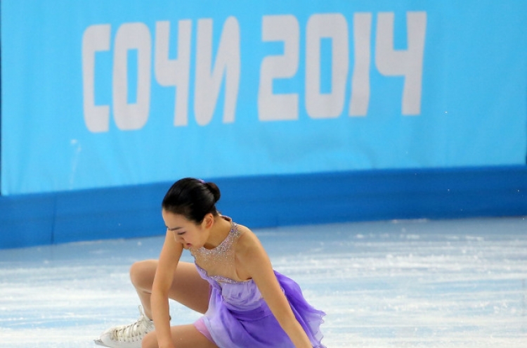 Japan's Asada has sudden, deep fall on Olympic ice