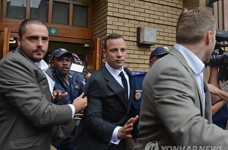 Witness in Pistorius trial hears “screams and gunshots”
