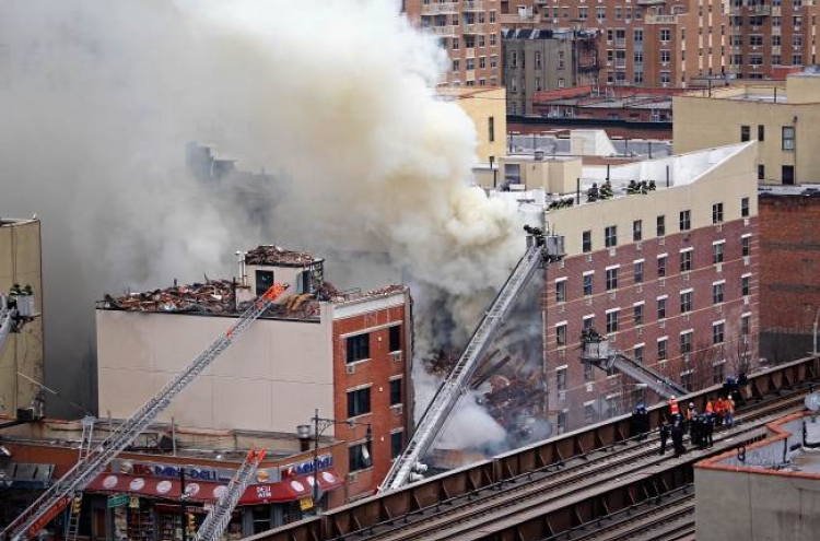 Gas blast destroys 2 NY buildings; 3 people dead