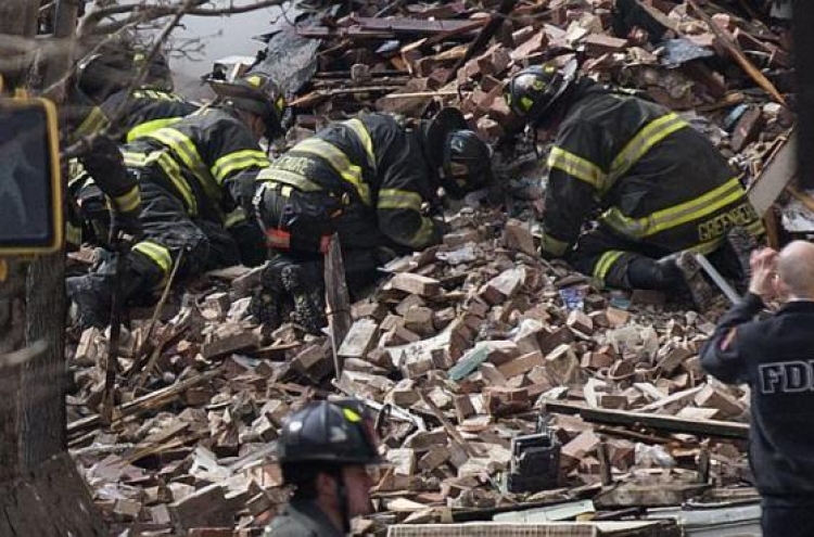 At least 6 dead in rising death toll in New York buildings collapse