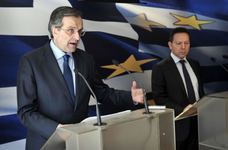 Greece reaches troika deal