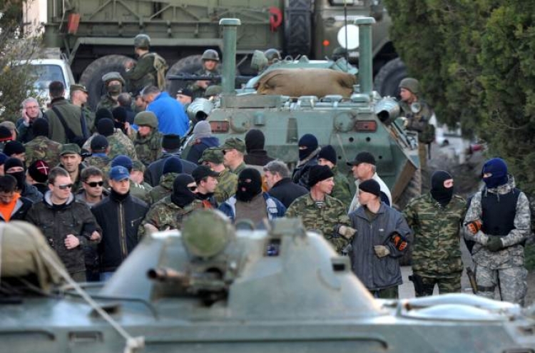 Russian troops storm Ukraine airbase