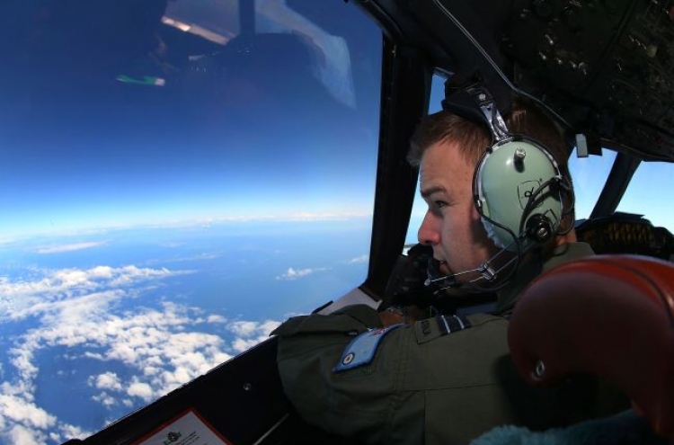 Search for Malaysian plane suspended due to bad weather