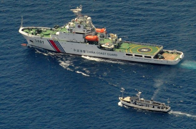 Philippine supply ship evades Chinese vessel
