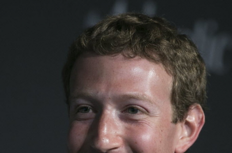 Mark Zuckerberg’s base salary falls to $1