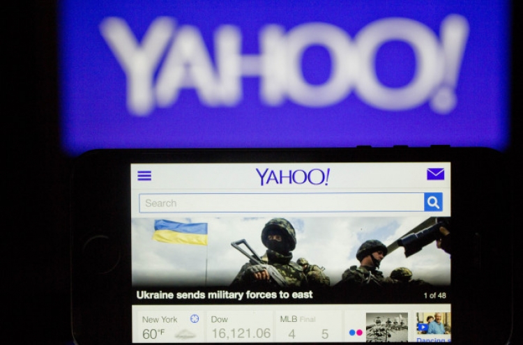 Yahoo, Intel shares rise