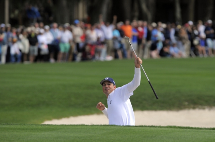 Kuchar chips in for RBC Heritage win