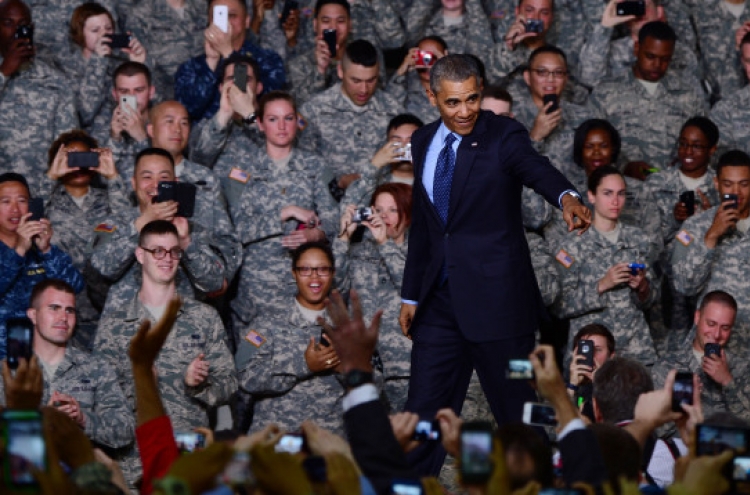 Obama warns N.K. of U.S. military might