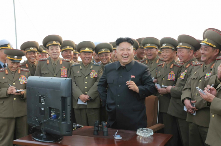 N. Korea's Kim leads key military meet, artillery drill