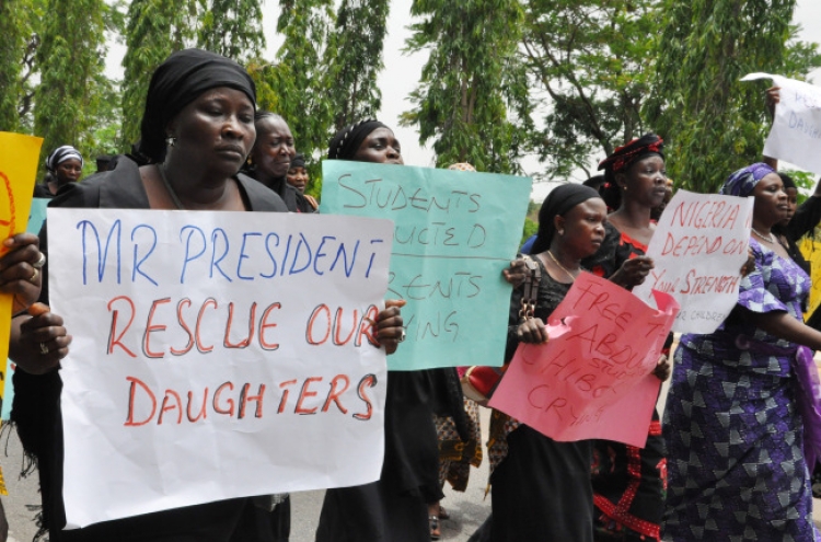 Outrage grows two weeks after Nigerian girls kidnapped