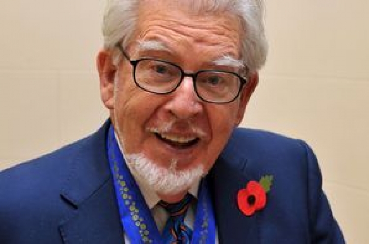 Australian entertainer Rolf Harris in U.K. court on sex charges