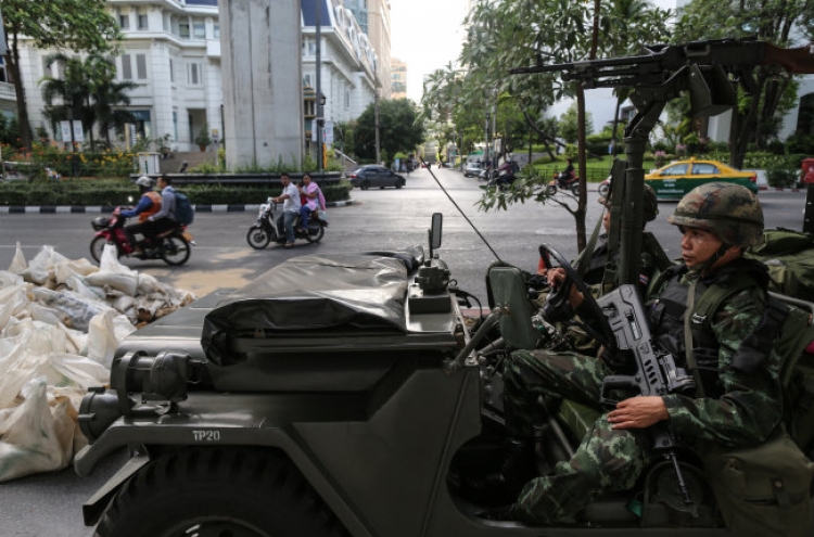Thai army invokes martial law to quell unrest in Bangkok