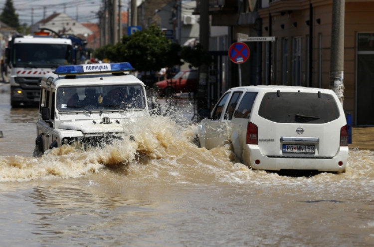 Disease warning in deluged Balkans