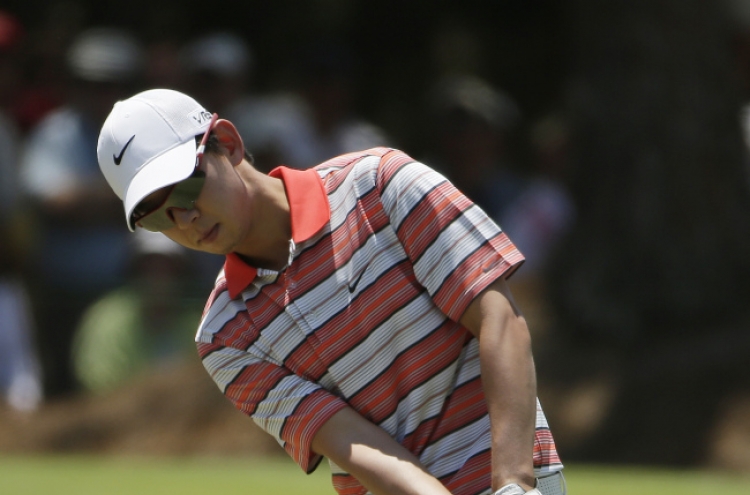 Kaymer protects lead on tough day