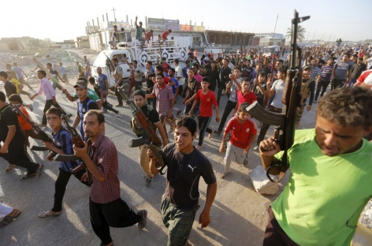 West evacuates Iraq staff