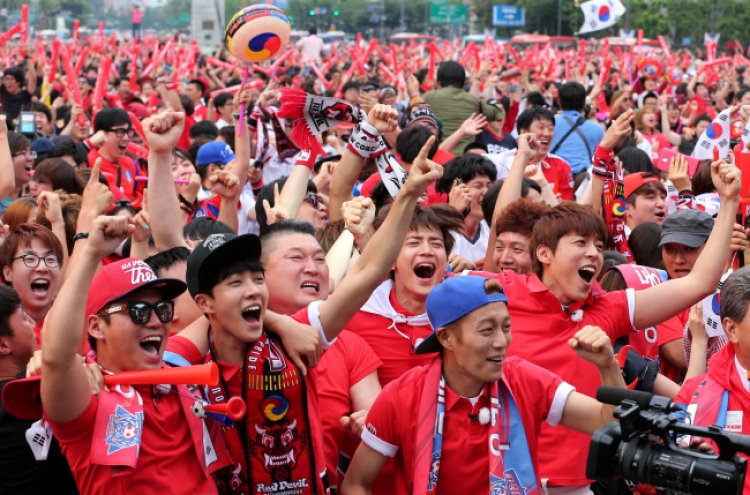 [World Cup] Wave of fans in red shirts fills streets to cheer for Korea