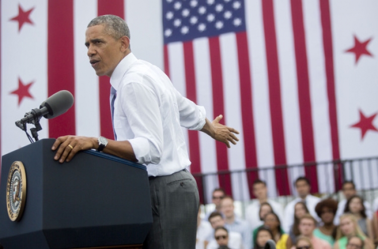 ‘Sue me’ Obama draws strength from showdown with Republicans